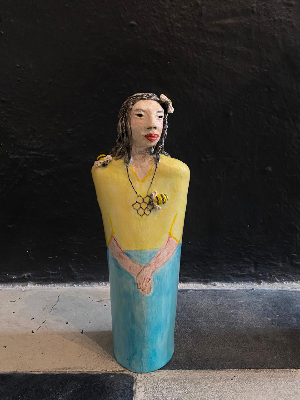 She who carries the hive